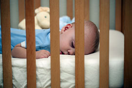 baby sleeping in crib